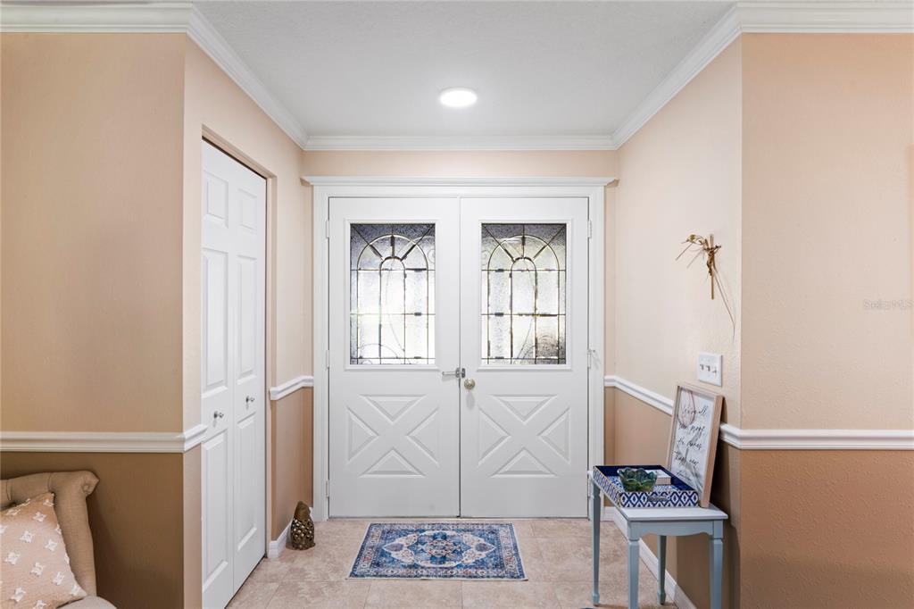 7112 Green Abbey Way Spring Hill, FL 34606 - Photo 8 of 66 a view of an entryway with wooden floor