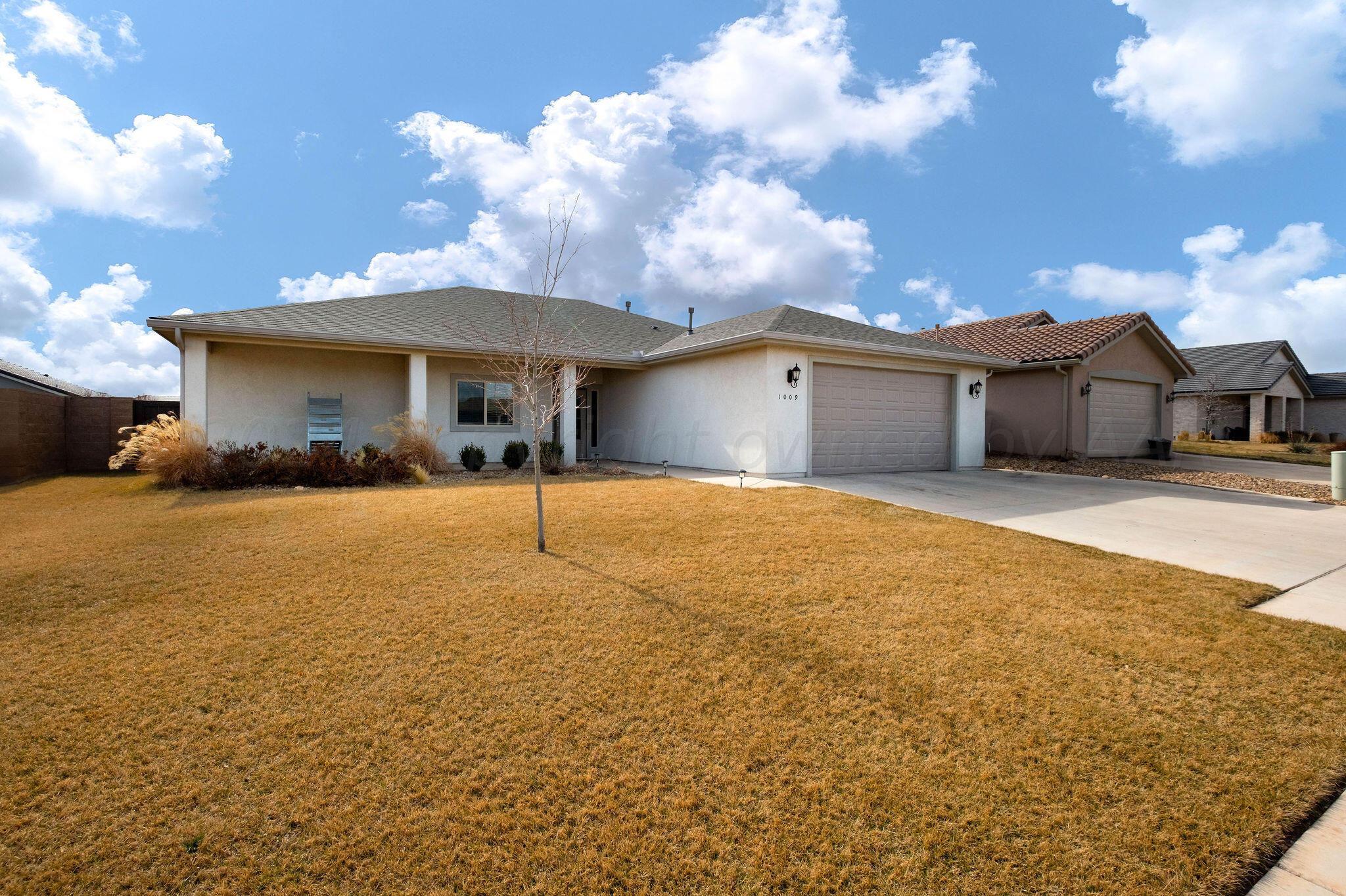 1009 Syrah Boulevard Amarillo, TX 79124 - Photo 2 of 35 a view of a house with a yard