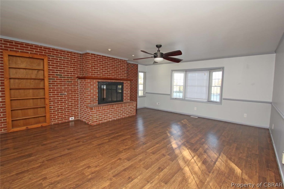 4960 Mary Ball Road Lancaster, VA 22503 - Photo 15 of 34 Family Room has a built-in in the Brick Wall