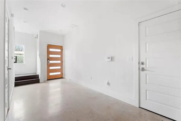 a view of a room with windows