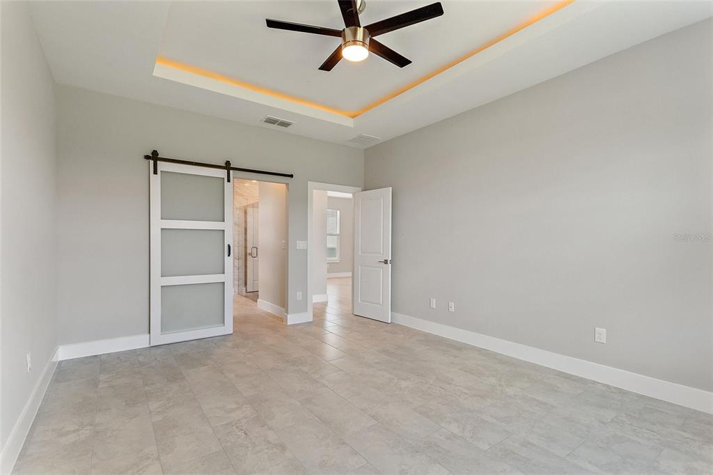 24399 Southwest Kingsway Circle Punta Gorda, FL 33983 - Photo 27 of 38 a view of an empty room