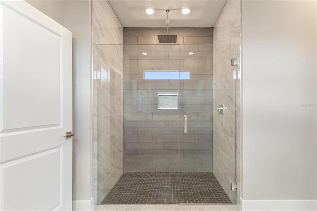 24399 Southwest Kingsway Circle Punta Gorda, FL 33983 - Photo 30 of 38 a bathroom with a shower