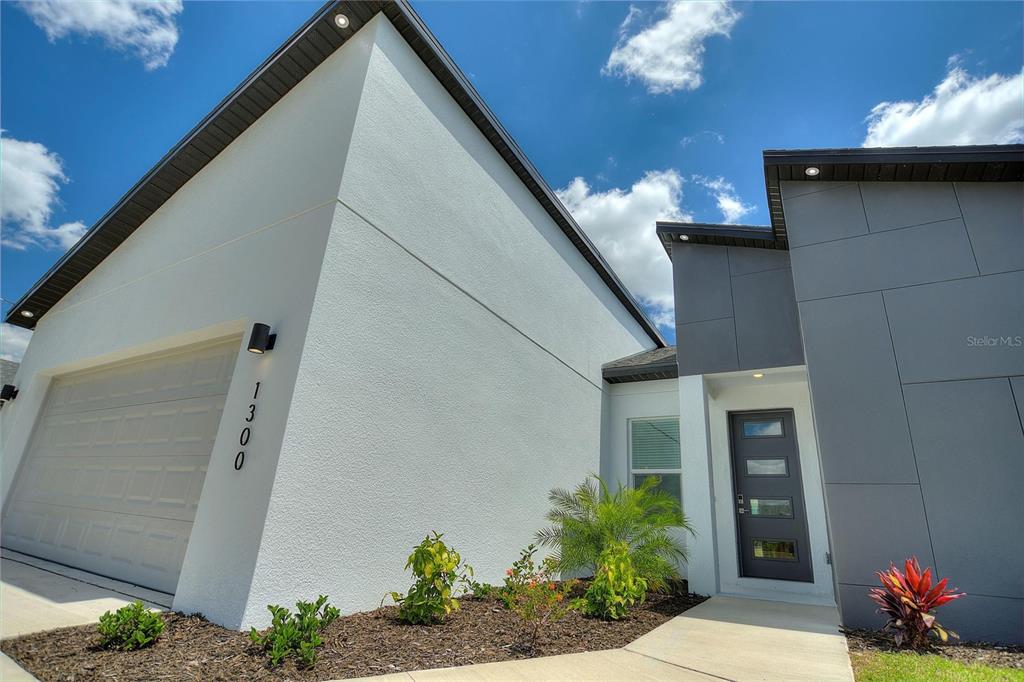 24399 Southwest Kingsway Circle Punta Gorda, FL 33983 - Photo 7 of 38 a front view of a house