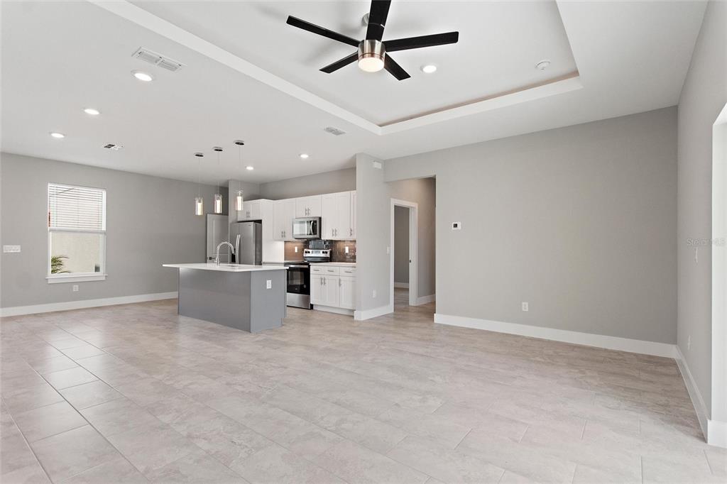 24399 Southwest Kingsway Circle Punta Gorda, FL 33983 - Photo 10 of 38 a view of a kitchen with a sink and cabinets