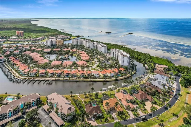 a view of a backyard with sitting area