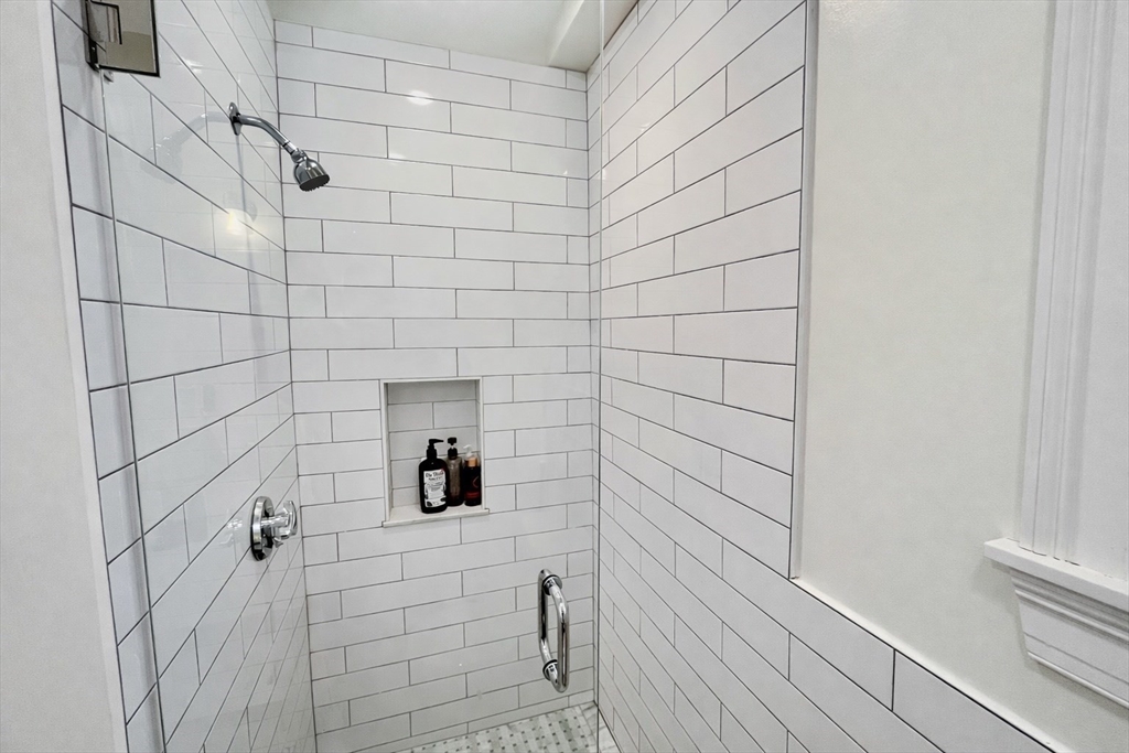 35 Foster Street, Unit 1 Boston, MA 02135 - Photo 16 of 21 a bathroom with a shower