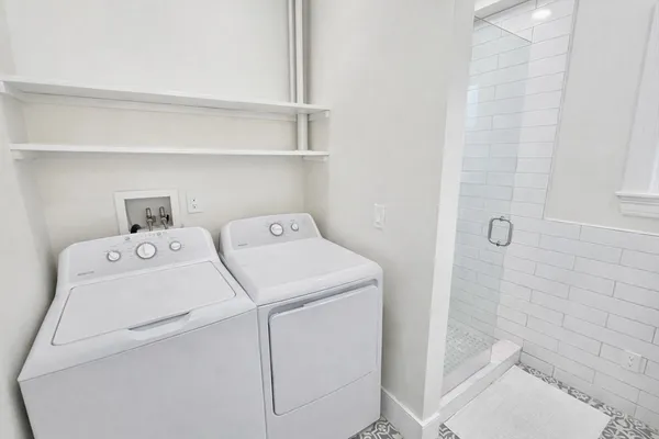 a utility room with dryer and washer