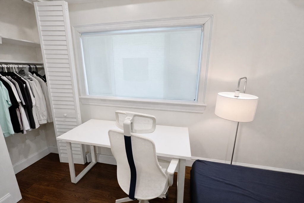 35 Foster Street, Unit 1 Boston, MA 02135 - Photo 20 of 21 a view of a dining room with furniture and wooden floor