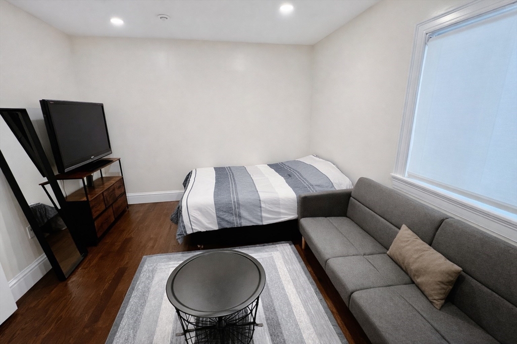 35 Foster Street, Unit 1 Boston, MA 02135 - Photo 10 of 21 a living room with furniture