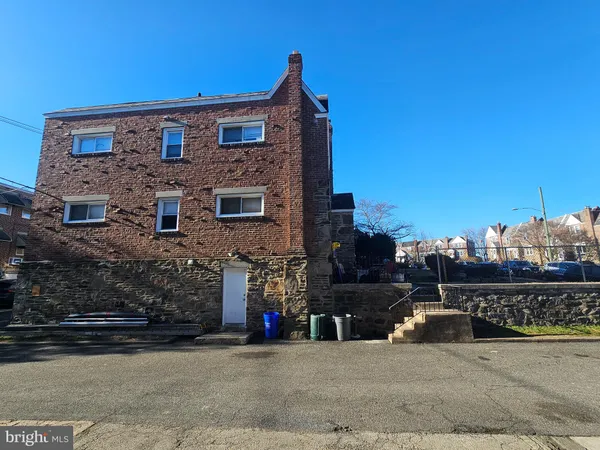 a view of a building with a street