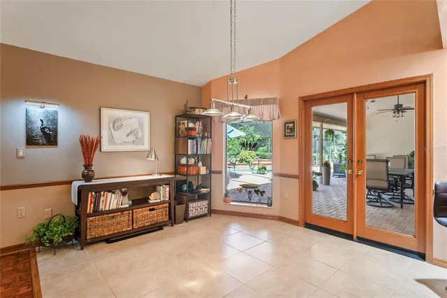a view of a dining room with furniture window and outside view