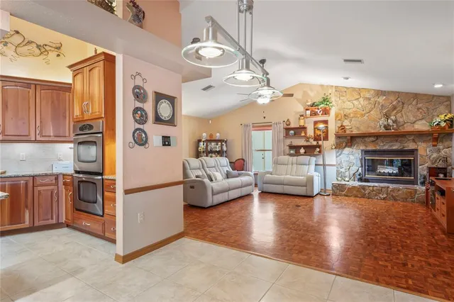 a lobby with furniture and potted plant