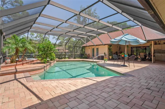 $588,000 | 7353 Dogwood Crescent, Spring Hill, FL 34607