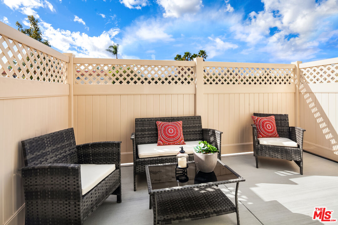 1385 Chervil Way Upland, CA 91786 - Photo 8 of 17 a terrace with outdoor seating and a potted plant