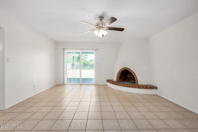 a view of an empty room and window