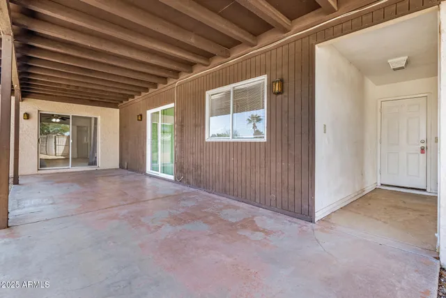 a view of backyard of a house