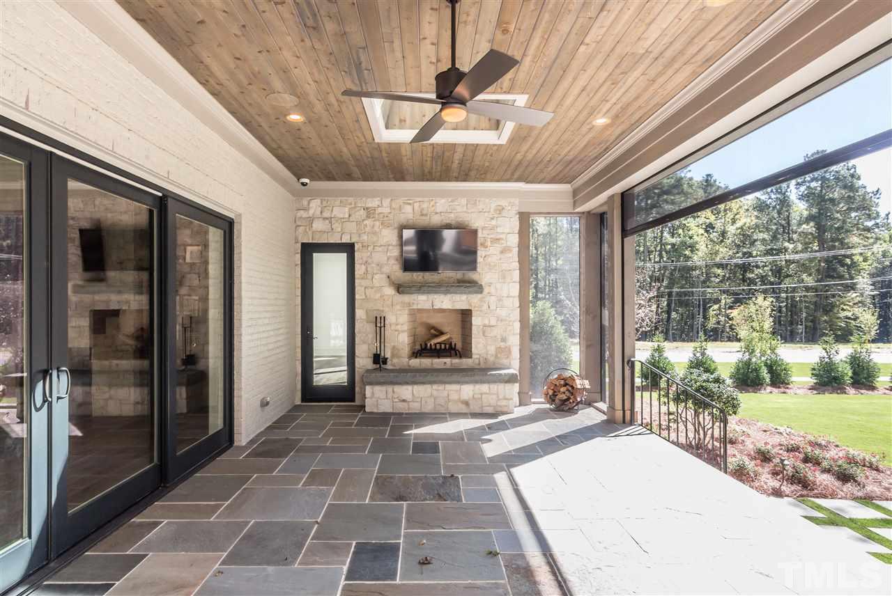 103 Turner Ridge Circle Durham, NC 27713 - Photo 22 of 25 With vanishing screens, fireplace and TV