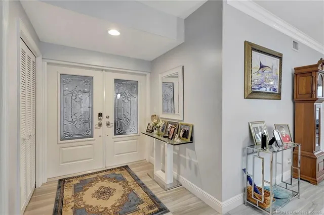 a kitchen with stainless steel appliances granite countertop a sink and dishwasher a stove with wooden cabinets