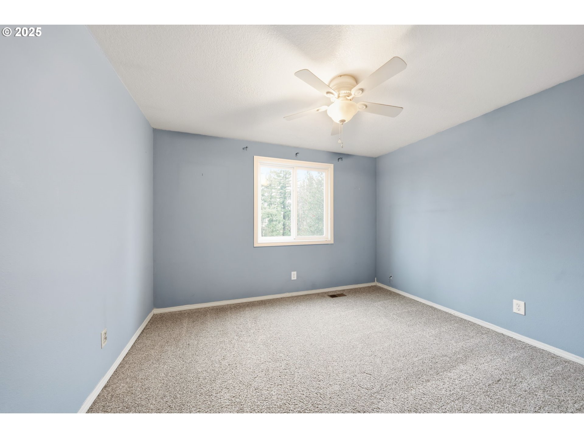 1005 Southwest 4th Street Gresham, OR 97080 - Photo 26 of 40 a view of an empty room with a window