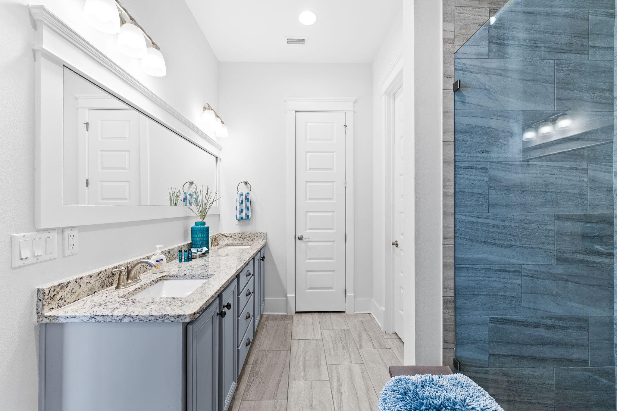 108 Gulfview Way Santa Rosa Beach, FL 32459 - Photo 23 of 51 a bathroom with a granite countertop sink a vanity and a mirror