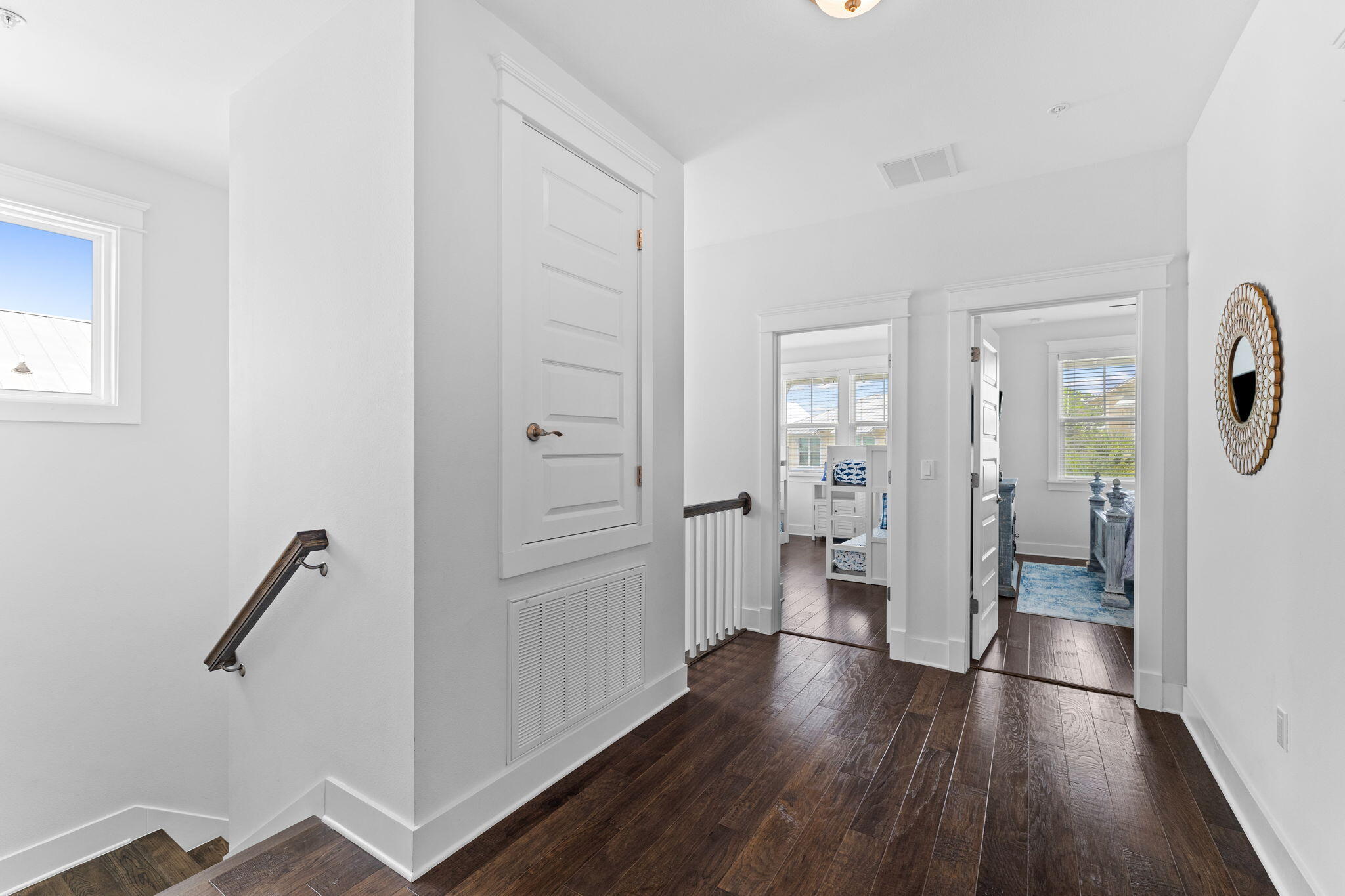 108 Gulfview Way Santa Rosa Beach, FL 32459 - Photo 27 of 51 a view of a hallway with wooden floor and a bathroom