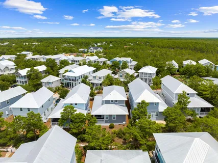 an aerial view of a house with a garden