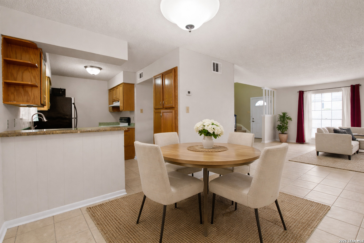 6427 Wurzbach Road, Unit 54 San Antonio, TX 78240 - Photo 1 of 18 a view of a dining room with furniture