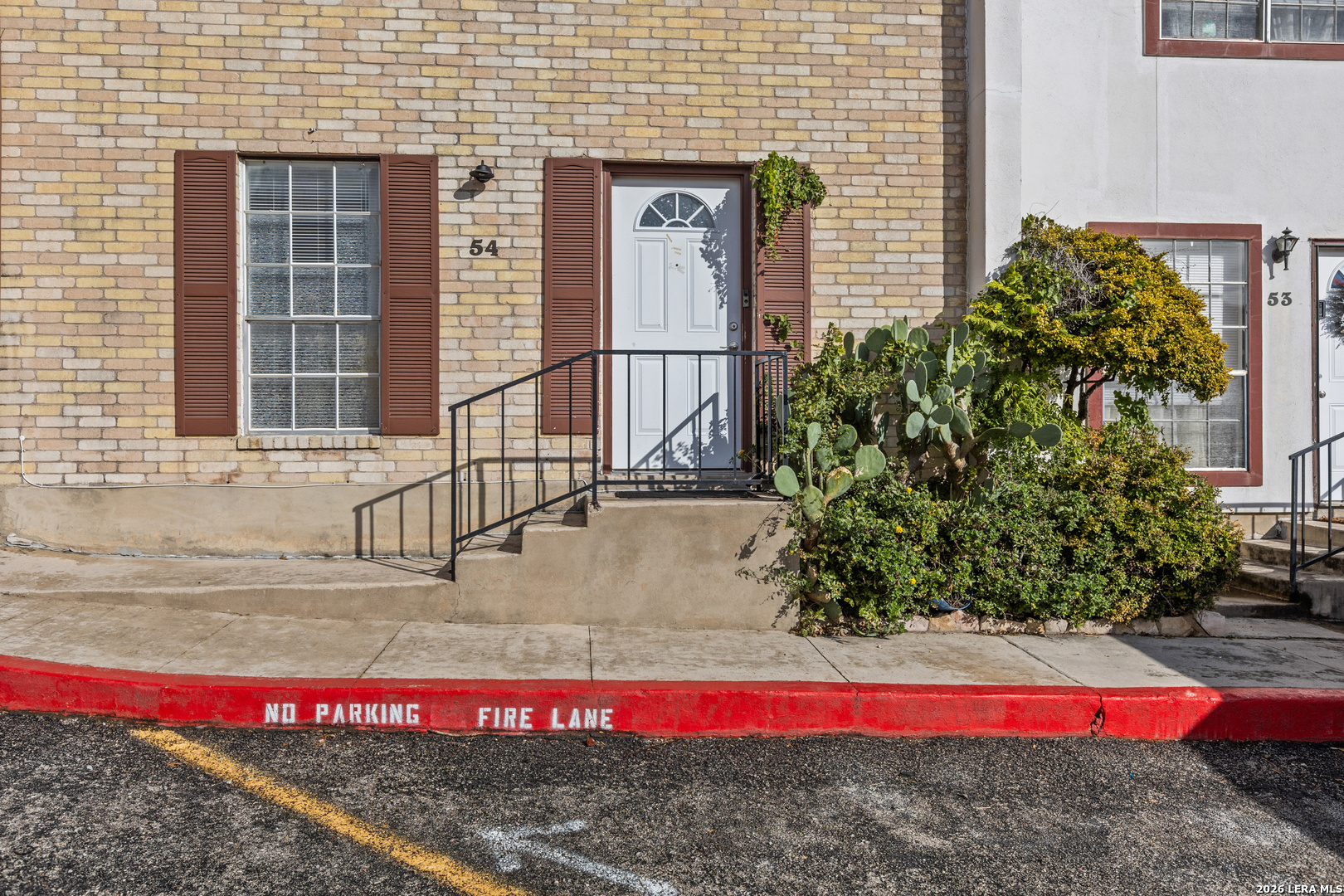 6427 Wurzbach Road, Unit 54 San Antonio, TX 78240 - Photo 13 of 18 a view of swimming pool with red door