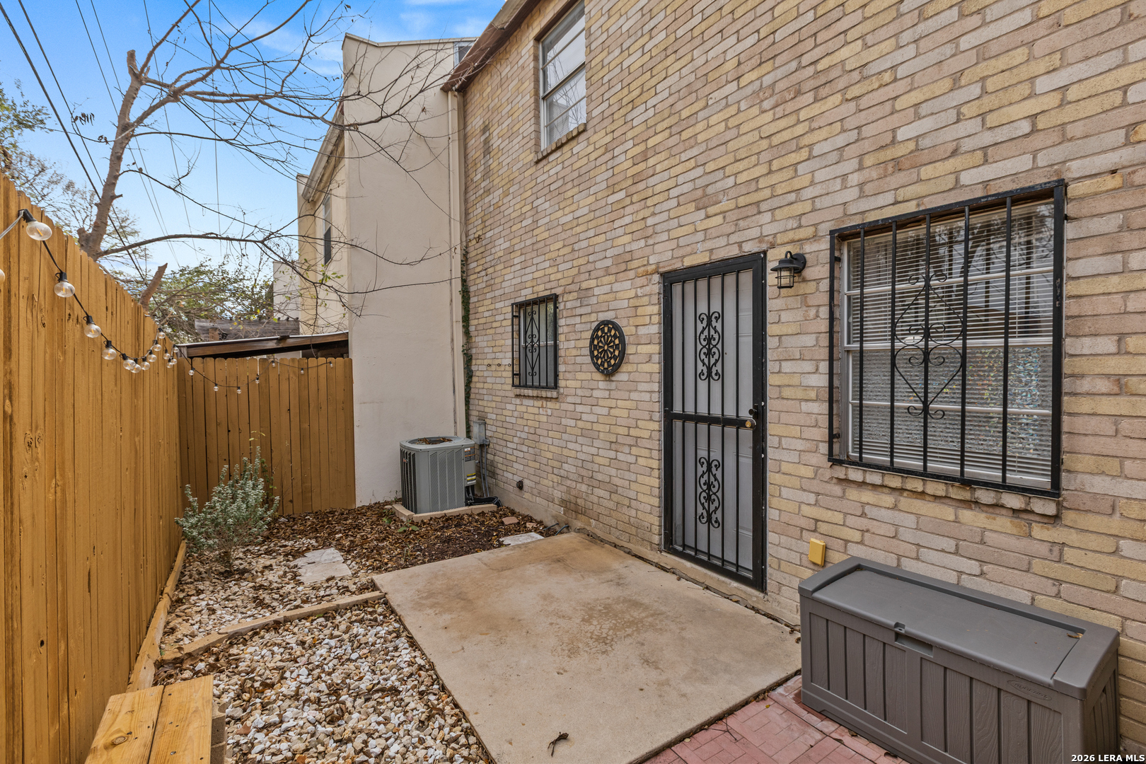 6427 Wurzbach Road, Unit 54 San Antonio, TX 78240 - Photo 16 of 18 a view of a house with a small backyard