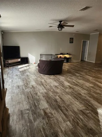 a kitchen with a white cabinets and white appliances
