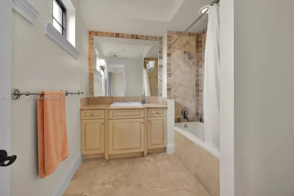 a view of a lake with a building in the background