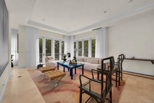 a kitchen that has a stove and a table