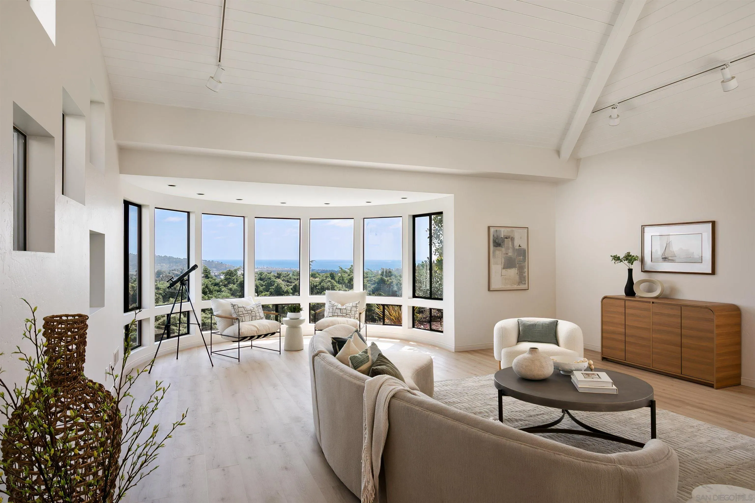 1050 Solana Drive Del Mar, CA 92014 - Photo 11 of 75 a living room with furniture and a large window