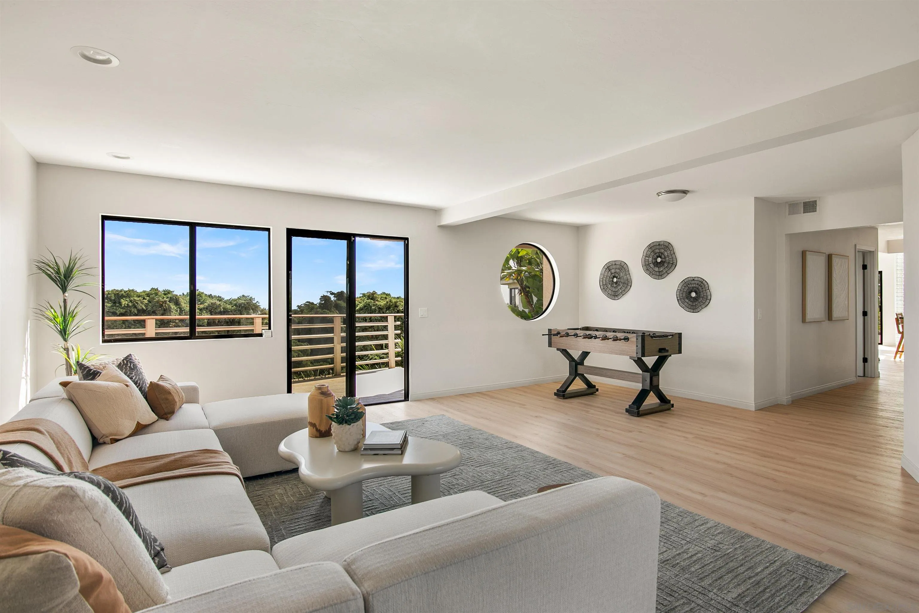 1050 Solana Drive Del Mar, CA 92014 - Photo 23 of 75 a living room with furniture and a large window