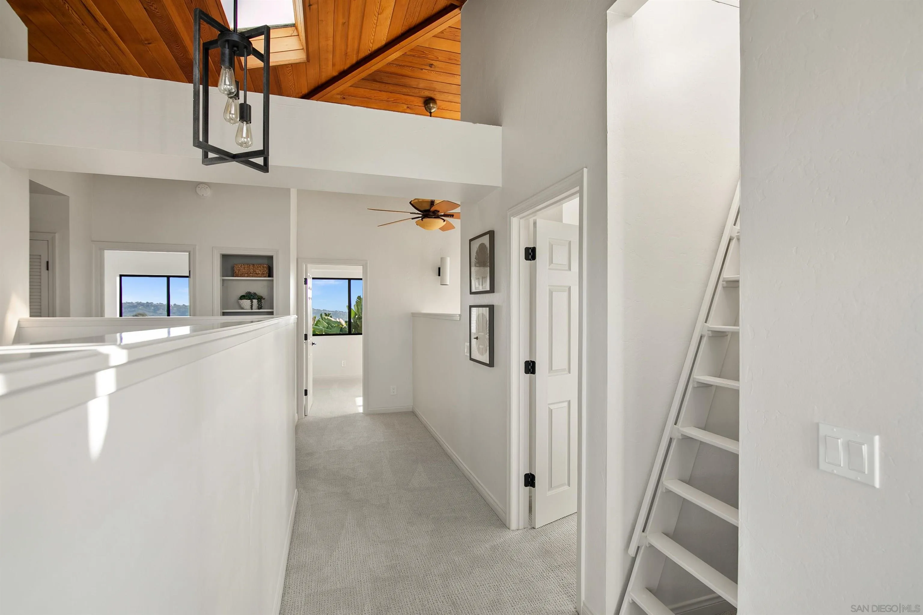 1050 Solana Drive Del Mar, CA 92014 - Photo 42 of 75 a view of a livingroom with wooden floor and stairs
