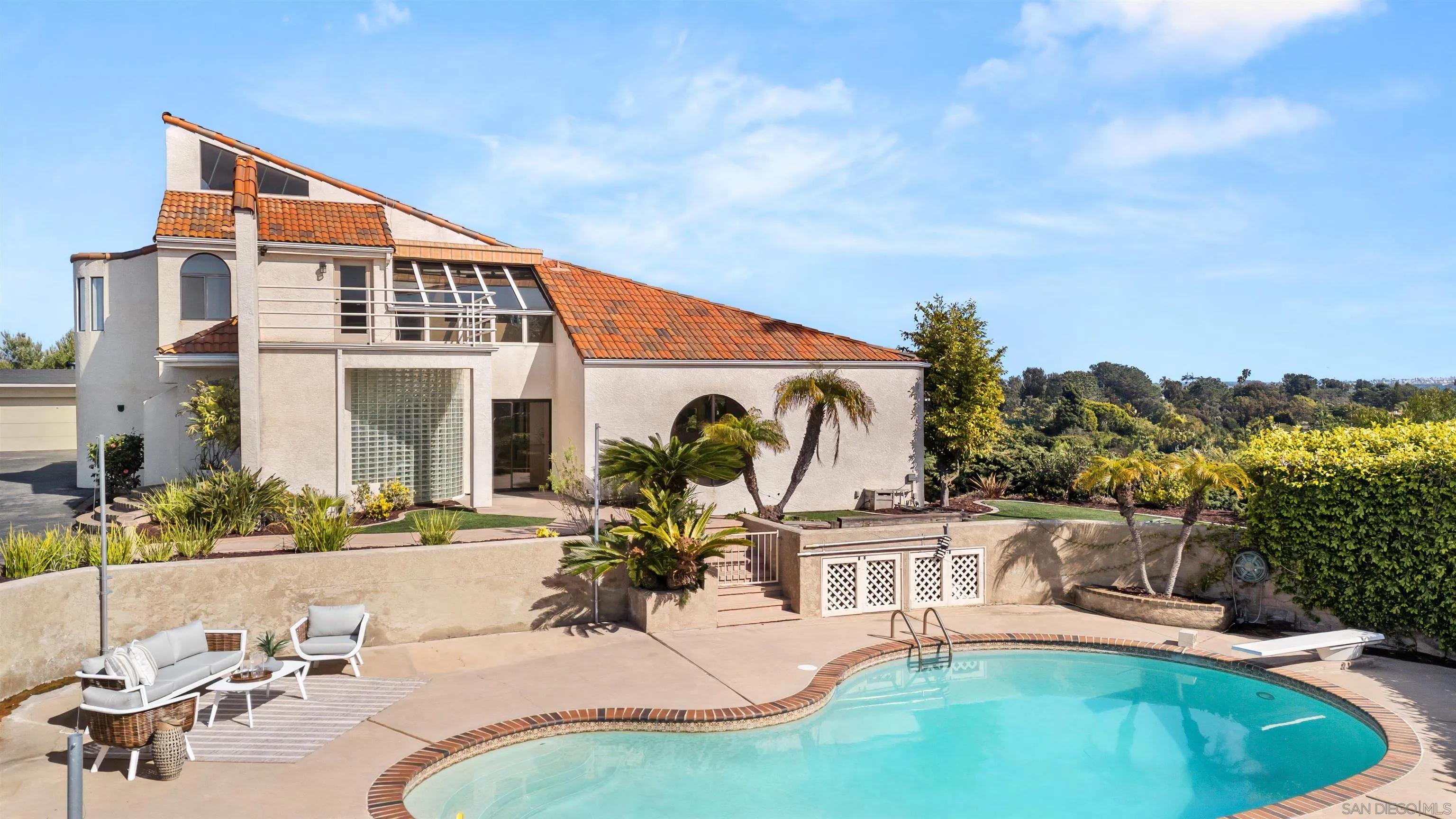 1050 Solana Drive Del Mar, CA 92014 - Photo 48 of 75 a view of a house with swimming pool and sitting area