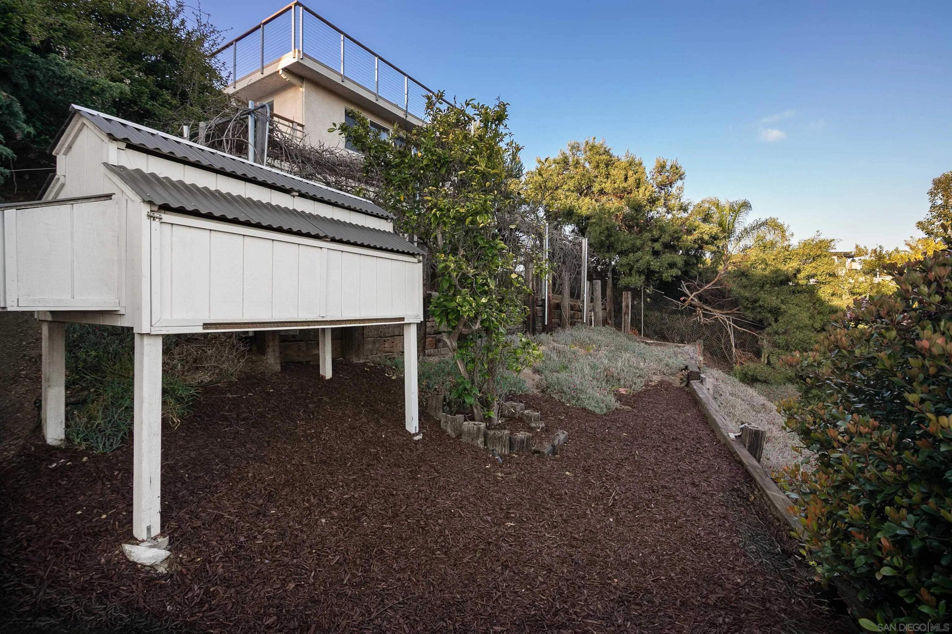 1050 Solana Drive Del Mar, CA 92014 - Photo 60 of 75 a backyard of a house with lots of green space
