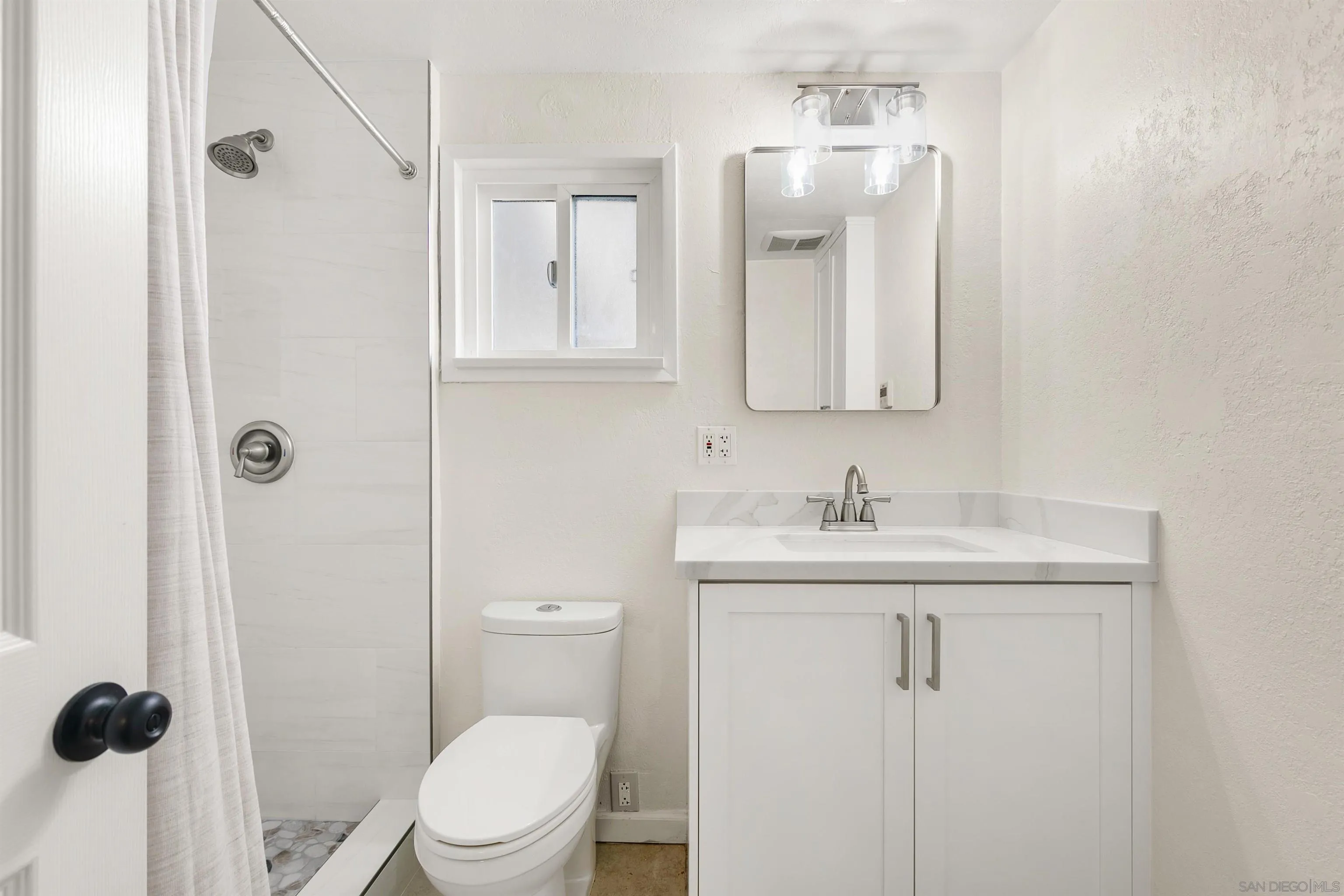 1050 Solana Drive Del Mar, CA 92014 - Photo 70 of 75 a bathroom with a granite countertop sink toilet and shower