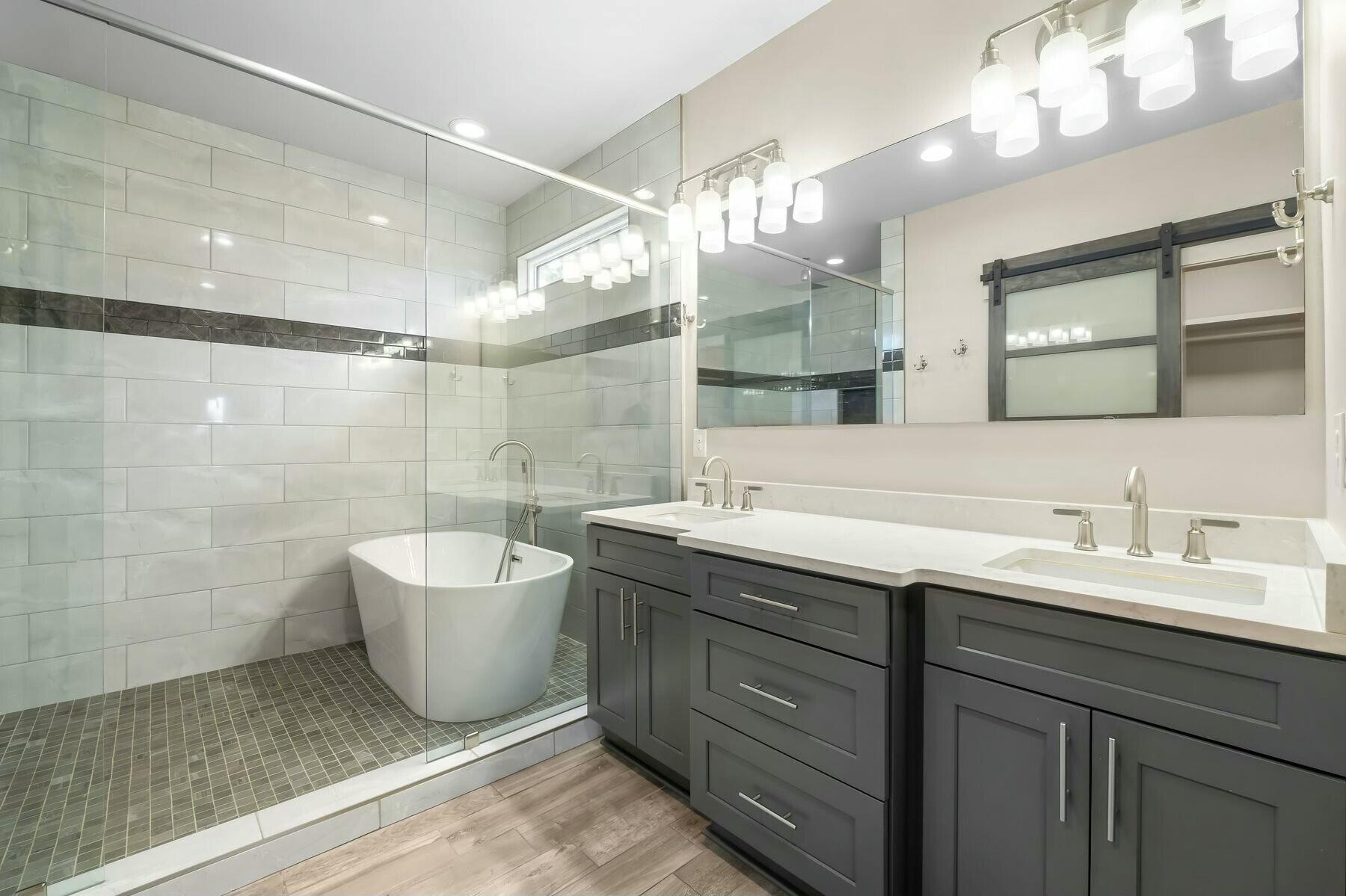 158 Driftwood Point Road Santa Rosa Beach, FL 32459 - Photo 11 of 24 a spacious bathroom with a bathtub shower sink double and mirror