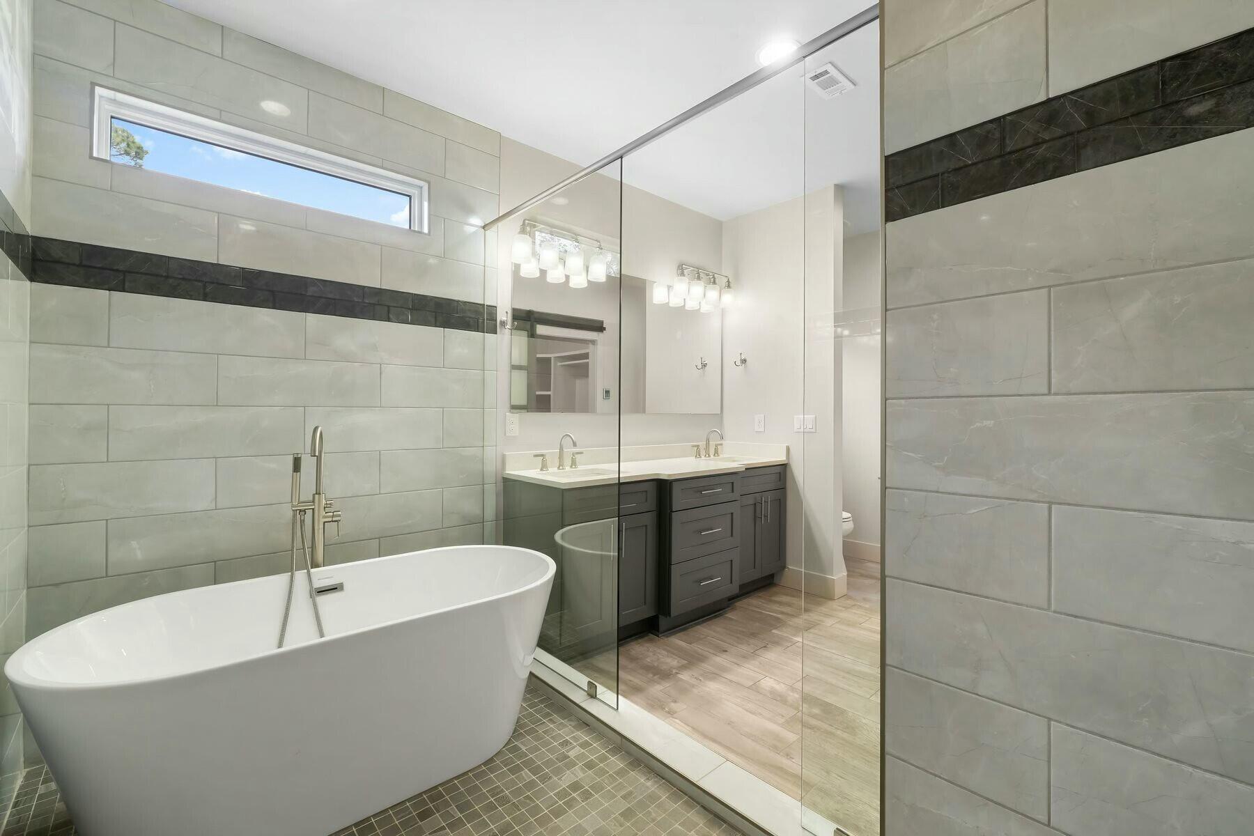 158 Driftwood Point Road Santa Rosa Beach, FL 32459 - Photo 12 of 24 a bathroom with a tub a sink and a shower