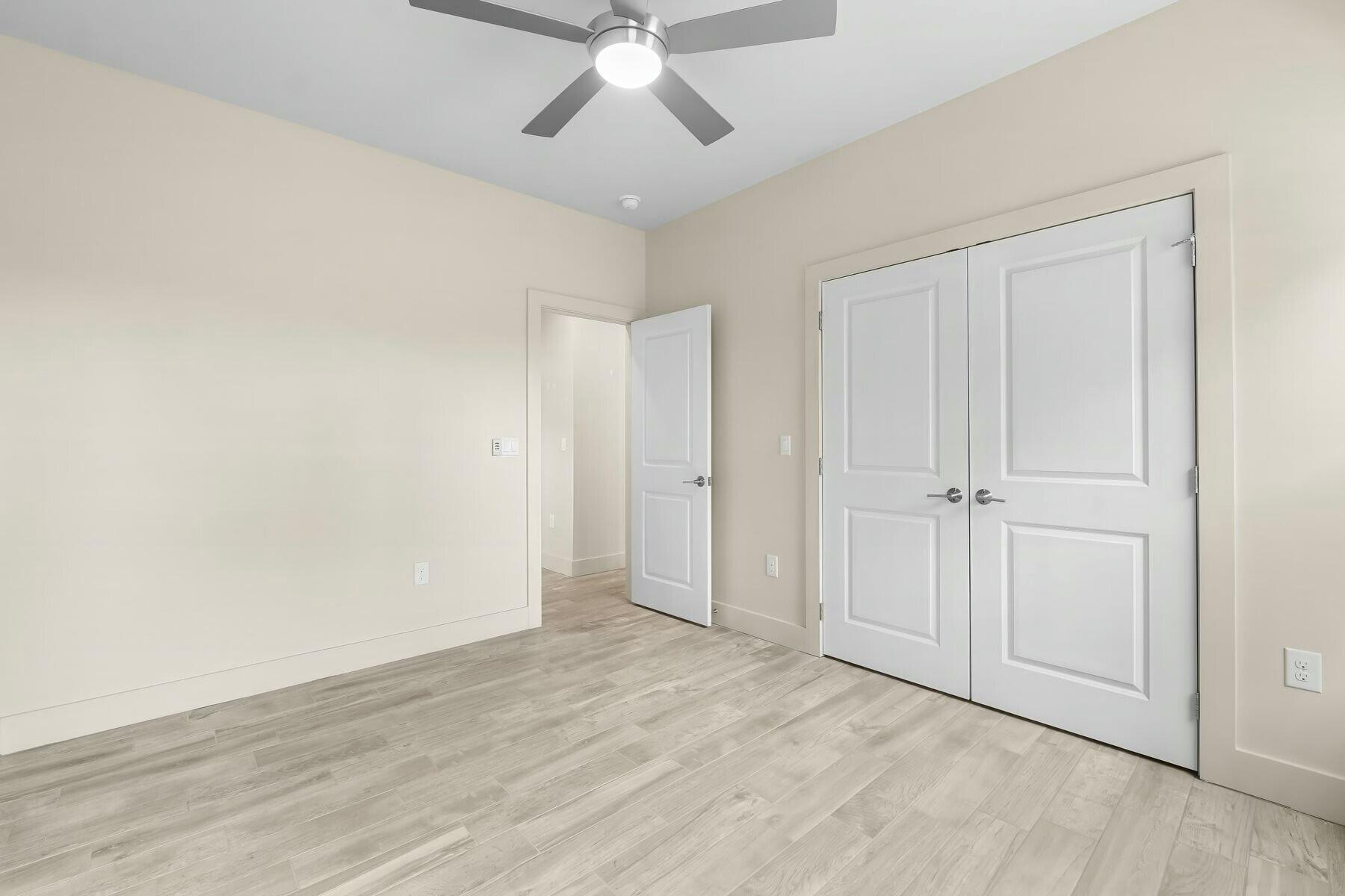 158 Driftwood Point Road Santa Rosa Beach, FL 32459 - Photo 16 of 24 a view of an empty room and wooden floor