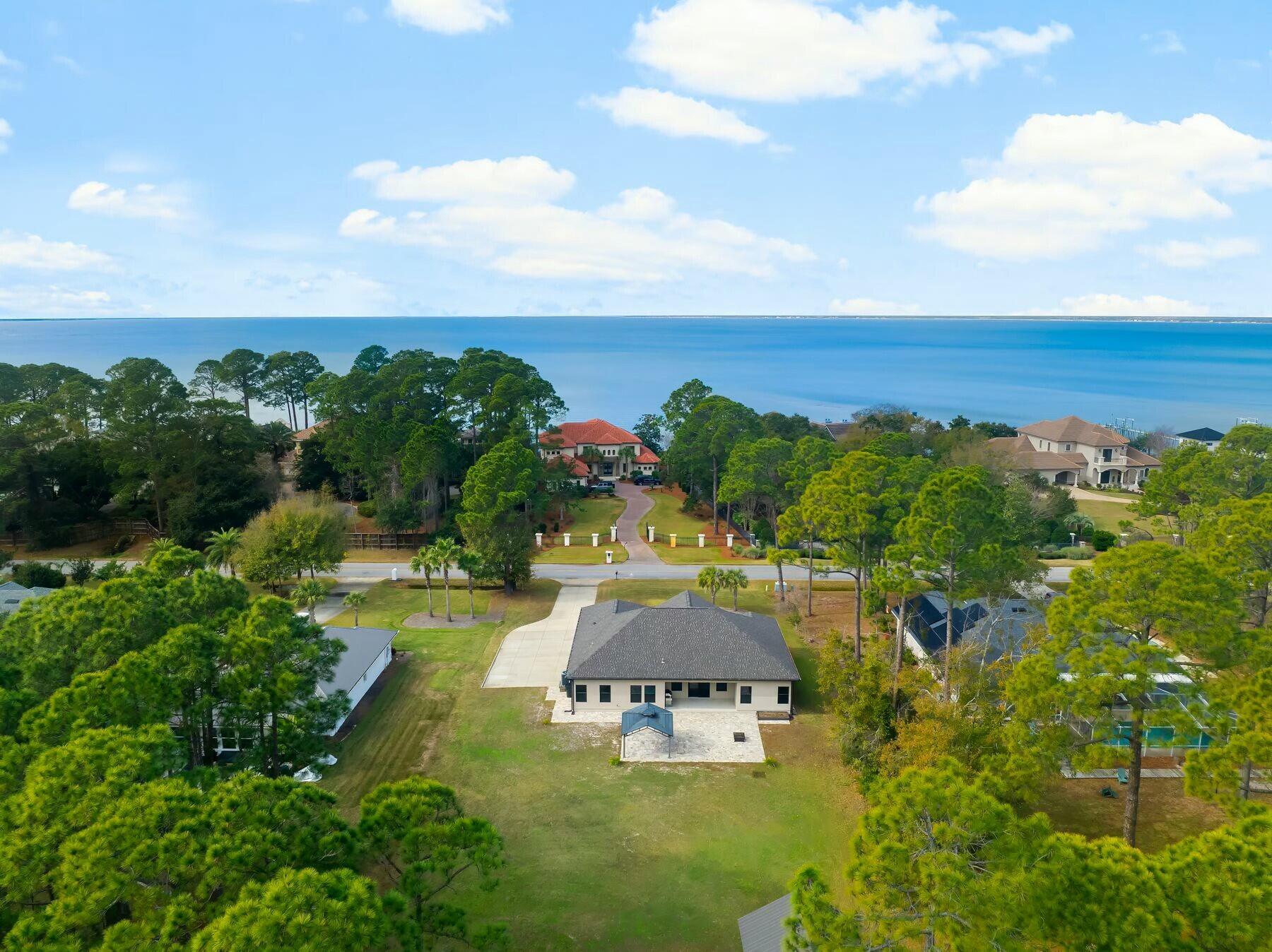 158 Driftwood Point Road Santa Rosa Beach, FL 32459 - Photo 20 of 24 an aerial view of a house with yard swimming pool and outdoor seating