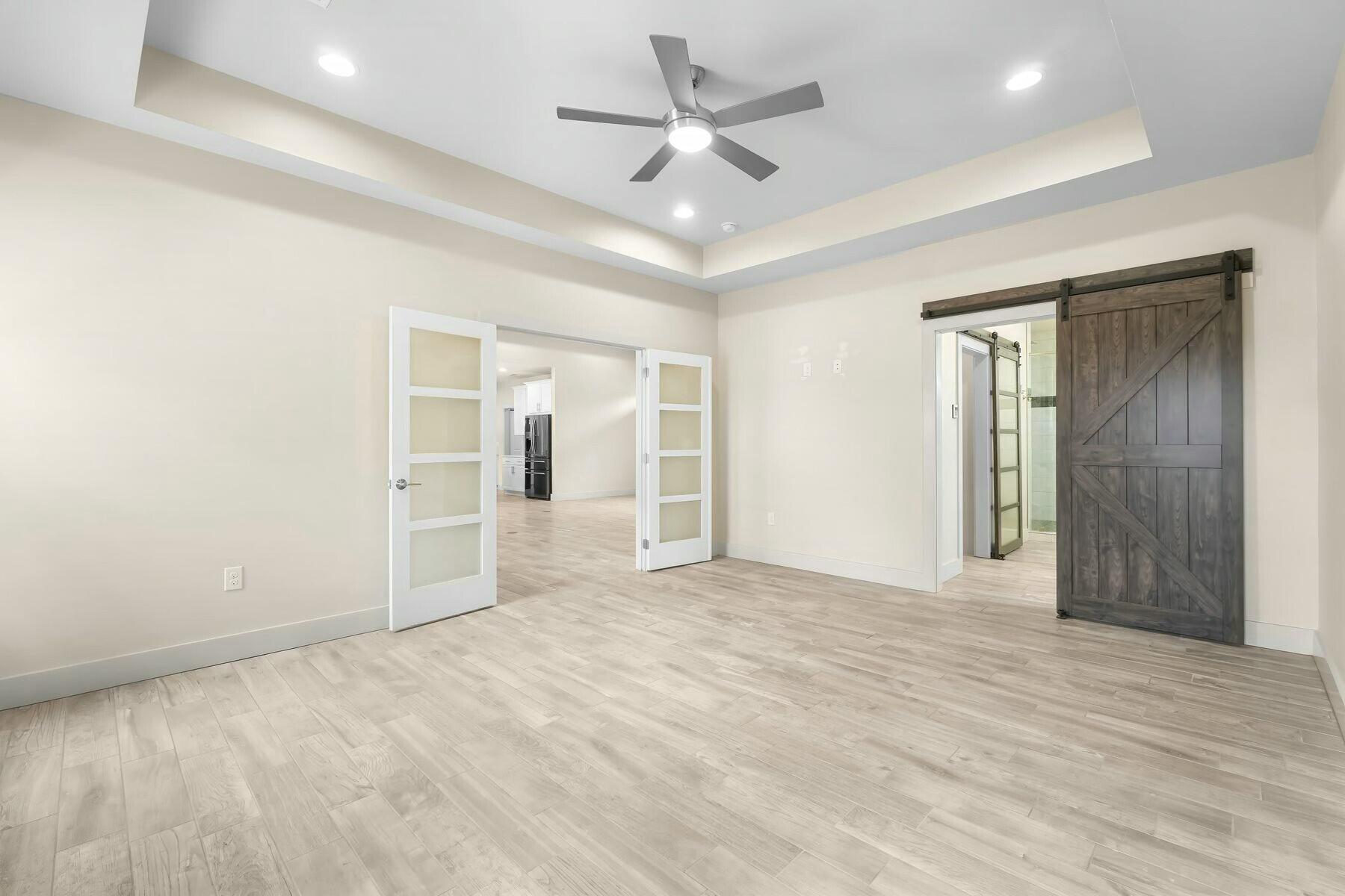 158 Driftwood Point Road Santa Rosa Beach, FL 32459 - Photo 9 of 24 an empty room with fan and entrance