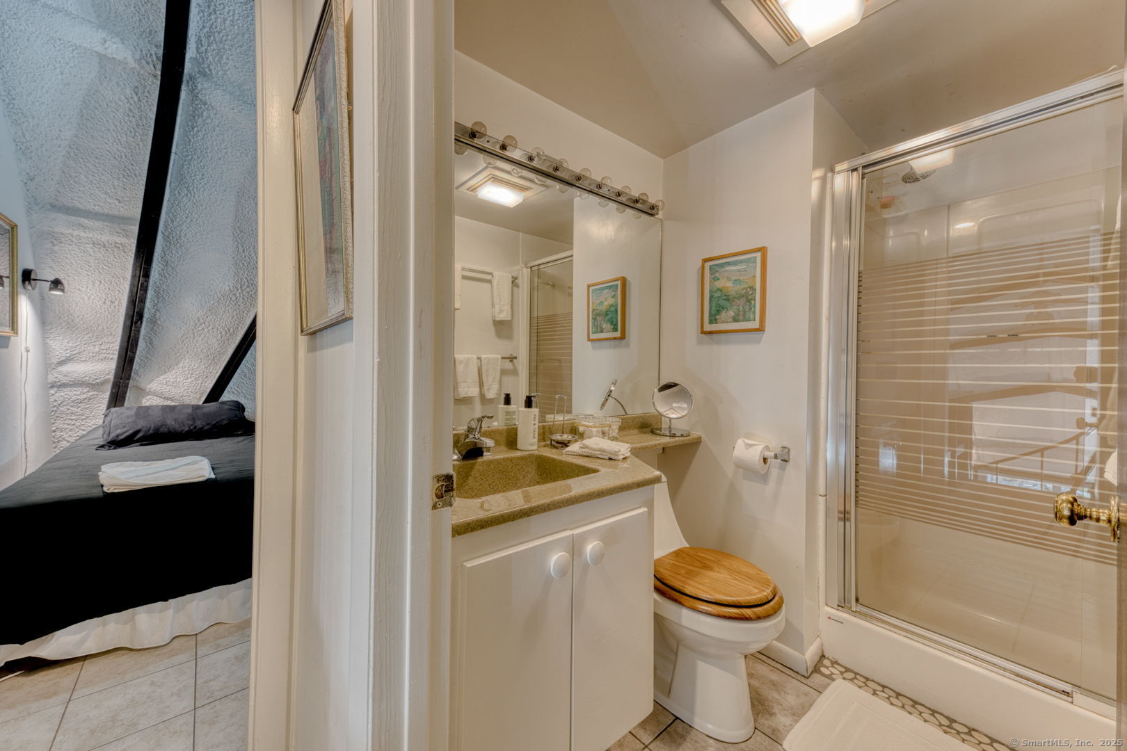 11 Day Road Cornwall, CT 06754 - Photo 23 of 40 a bathroom with a granite countertop sink toilet and shower