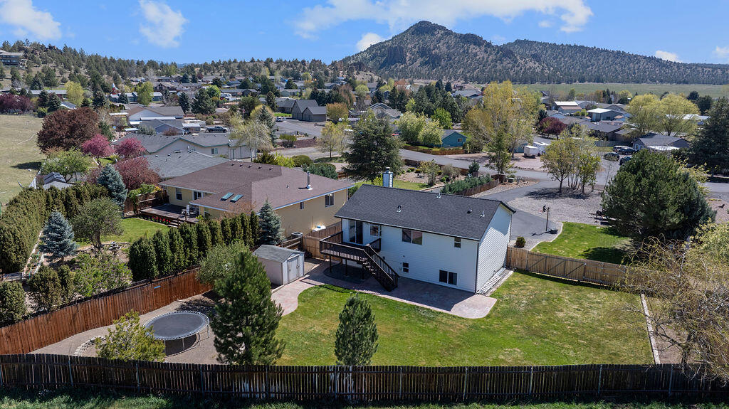 2979 Northeast Sugar Pine Road Prineville, OR 97754 - Photo 29 of 31 an aerial view of residential houses with outdoor space and river