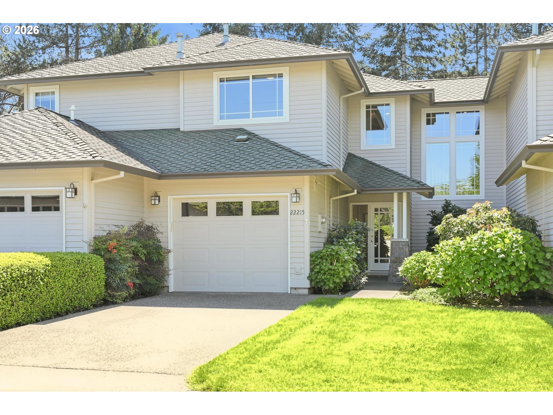 22215 Chelan Loop West Linn, OR 97068 - Photo 2 of 38 a view of a house with a yard
