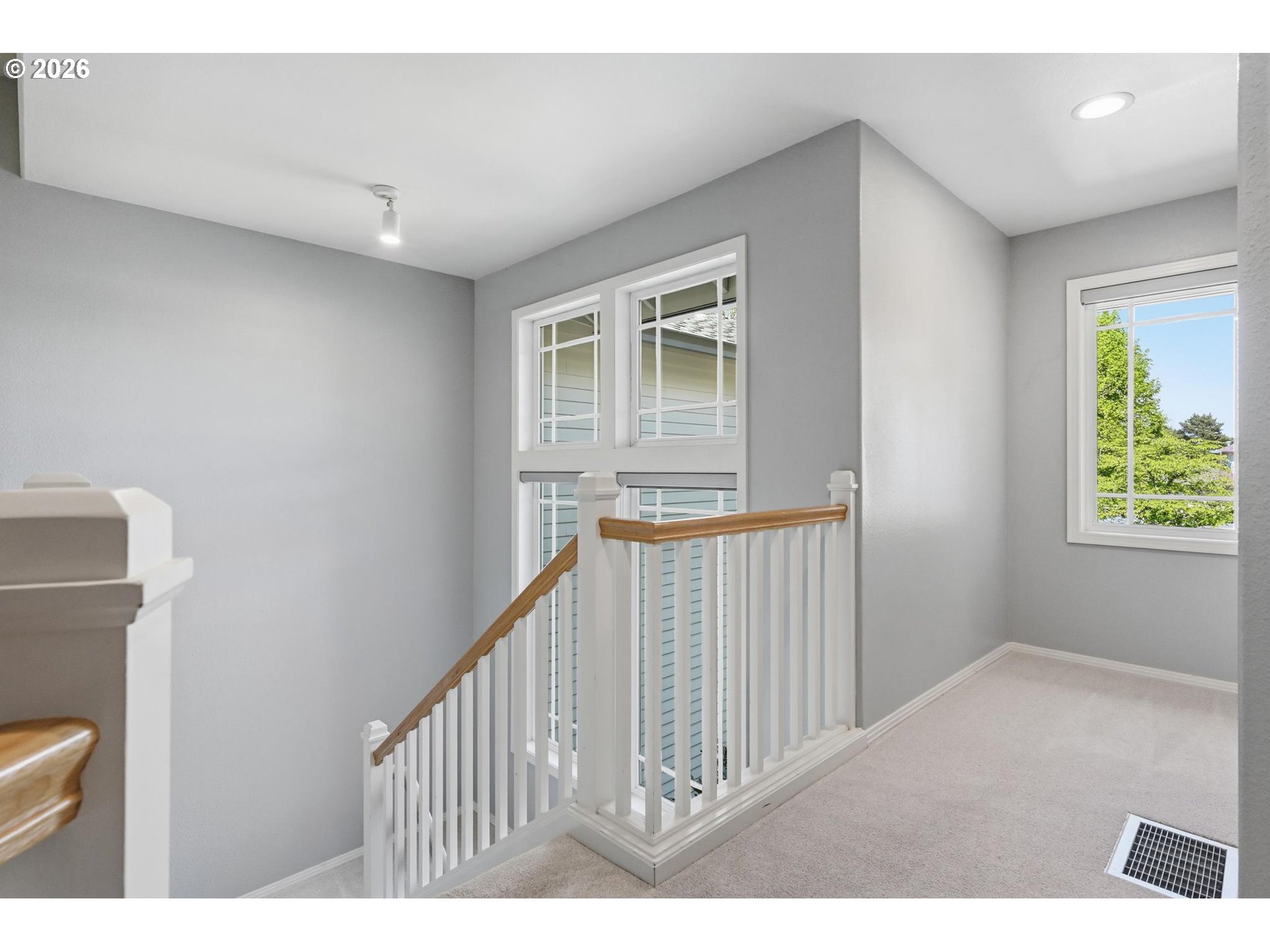 22215 Chelan Loop West Linn, OR 97068 - Photo 26 of 38 a view of a hallway with windows