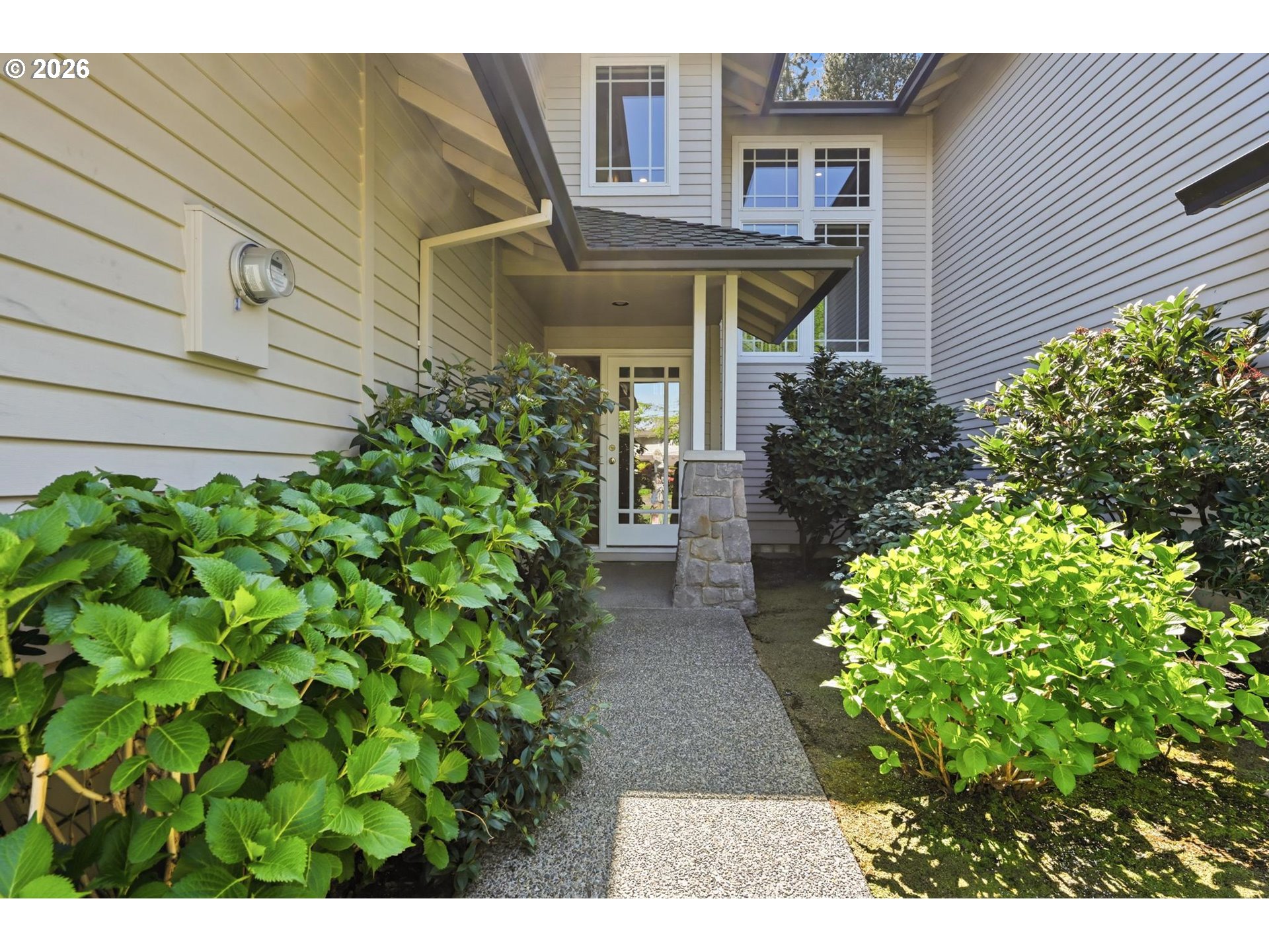 22215 Chelan Loop West Linn, OR 97068 - Photo 3 of 38 a view of a house with potted plants