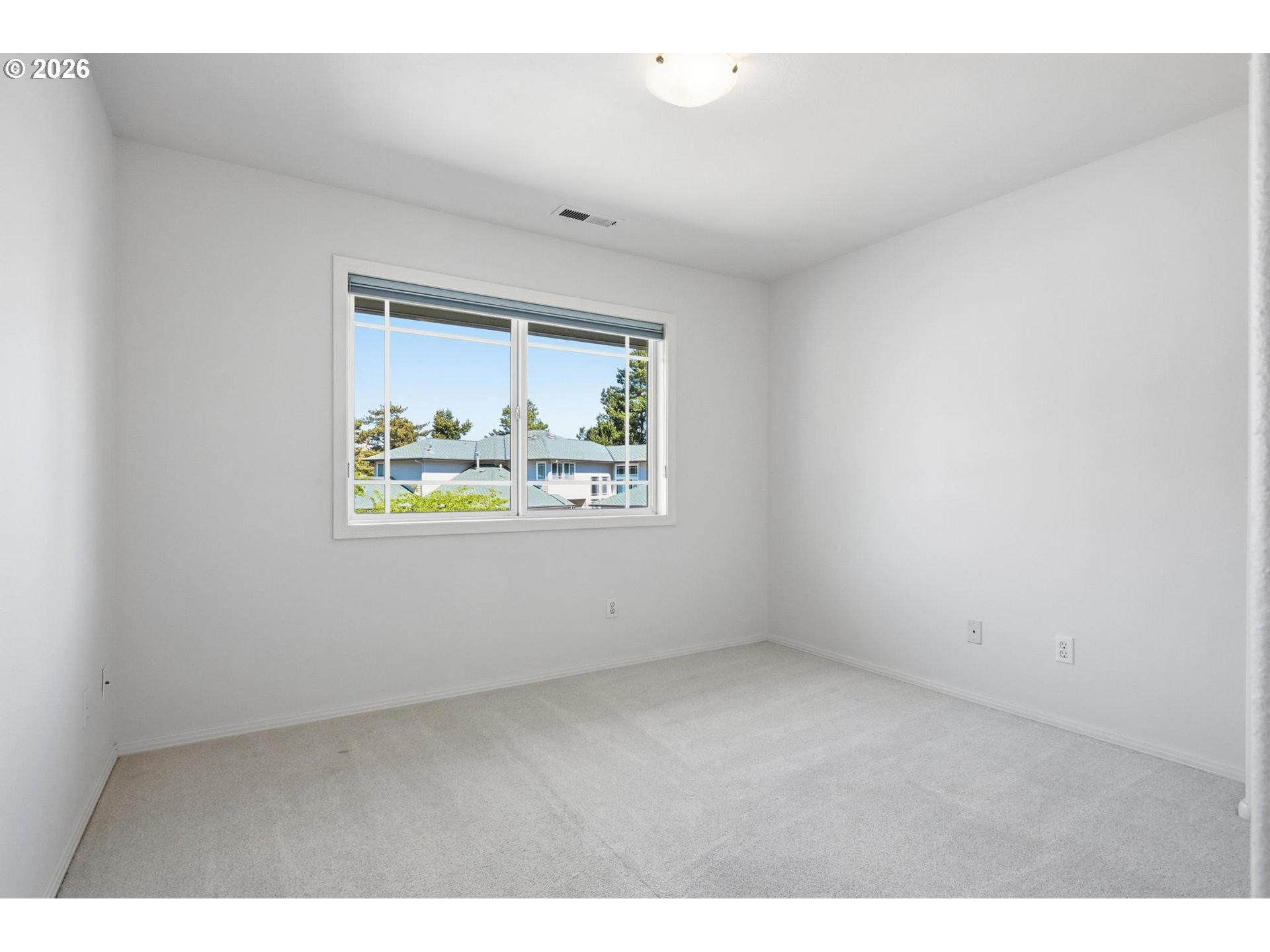 22215 Chelan Loop West Linn, OR 97068 - Photo 34 of 38 a view of an empty room with a window