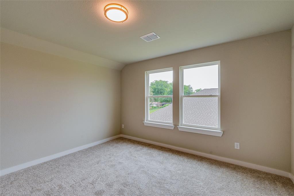 602 Kyle Drive Tioga, TX 76271 - Photo 24 of 29 an empty room with windows